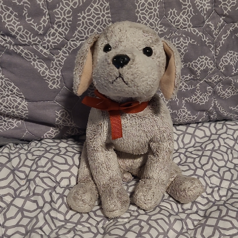 Plush Dog Toy with Red Bow